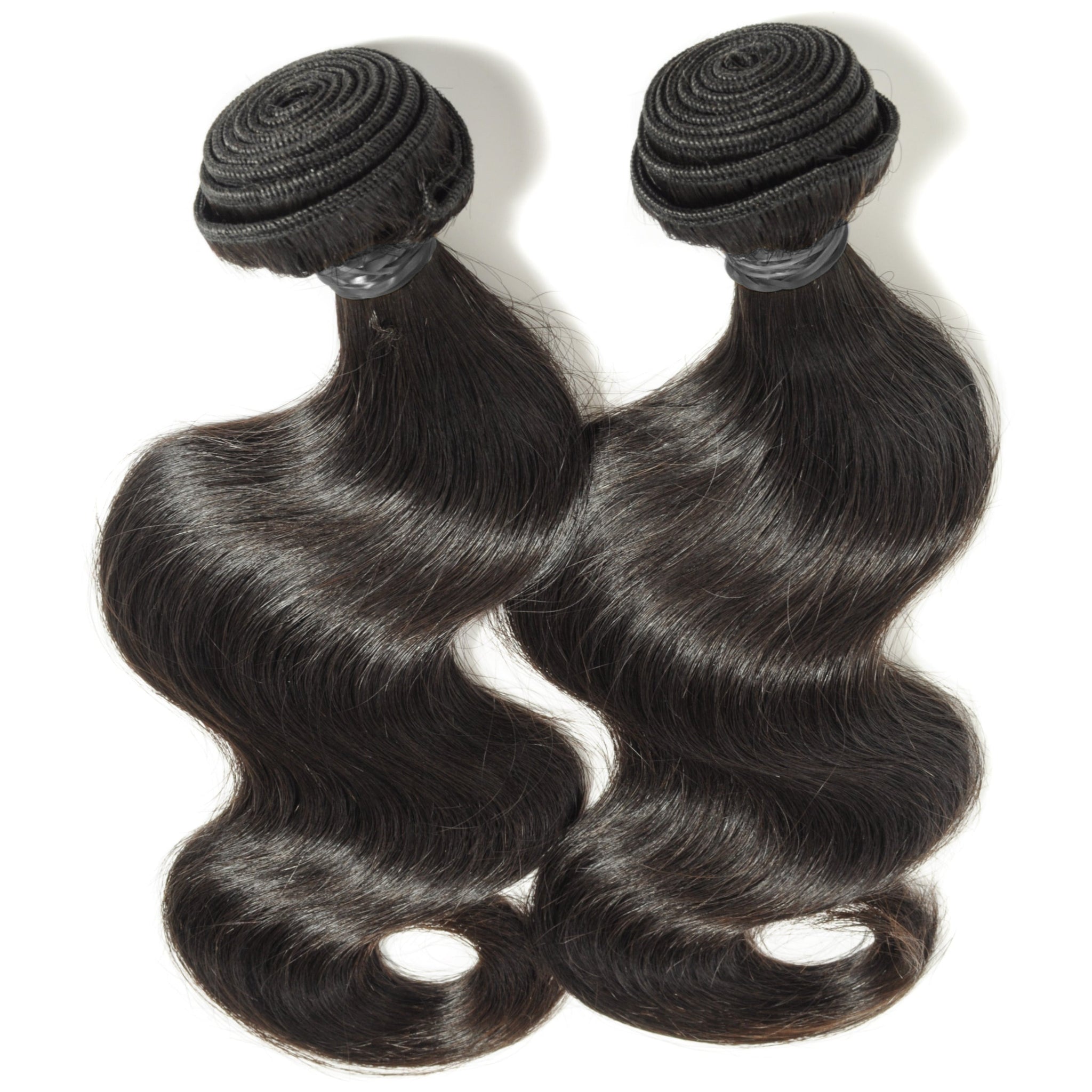 Discover the finest Virgin Hair Extensions, offering unmatched quality and natural beauty. Our 100% unprocessed virgin hair is carefully selected for its softness, durability, and versatility, making it the perfect choice for creating flawless, long-lasting styles. Whether you're looking to add length, volume, or texture, our virgin hair extensions blend seamlessly with your natural hair, providing a luxurious and natural look. Shop now to experience premium hair extensions that can be styled, colored, and 